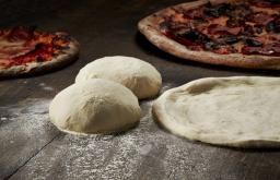 Step-by-step photo recipe for making quick and thin pizza dough without yeast using water at home